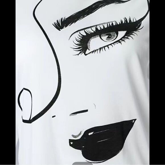 Cold shoulder, long sleeve polyester Top. With sexy eye smirk. - Picture 7 of 8